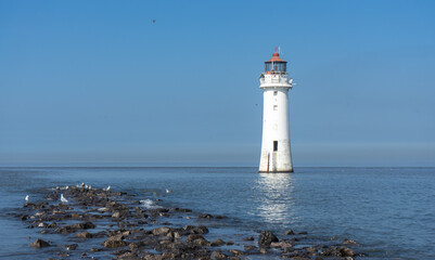 A lighthouse at high tide