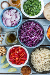ingredients for vegetarian salad with red cabbage and quinoa