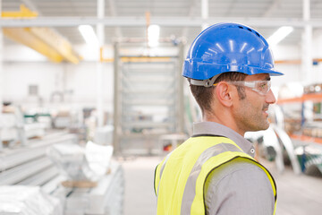 Portrait confident male worker in factory