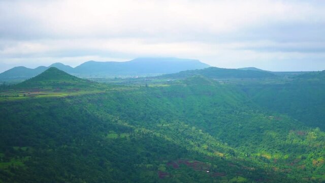 View of the clouds above the Sahyadri Mountain Range as seen from Saputara Table Point at Saputara in Gujarat, India. Nature background. Clouds above the hills during the monsoon season. 