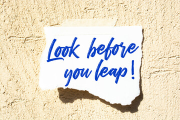 look Before You Leap write on Sticky Notes. Motivation conceptual Image