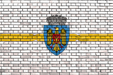 flag of Chisinau, Moldova painted on brick wall