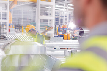 Male worker in steel factory