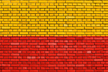 Plakat flag of Warsaw, Poland painted on brick wall