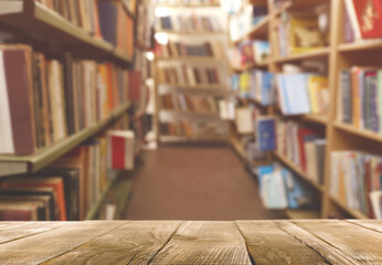 Empty wooden table in library. Space for design