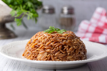 Traditional delicious Turkish dish, barley noodle pilaf (Turkish name; Arpa sehriye pilavi)