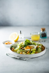 Green salad with egg and bread croutons