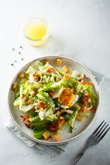 Green salad with egg and bread croutons