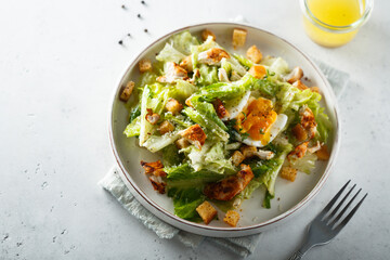 Green salad with egg and bread croutons