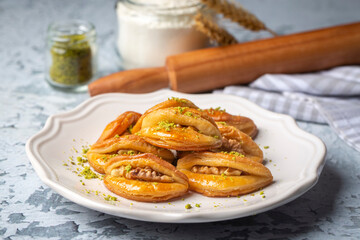 Dilberdudagi with walnut, traditional feast and ramadan dessert with syrup (Turkish name; Dilber dudagi)