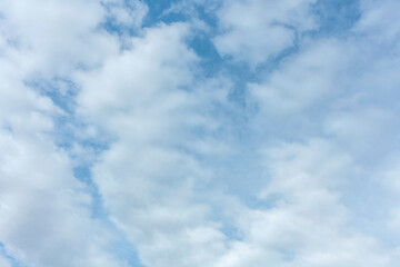 White clouds in a blue sky.