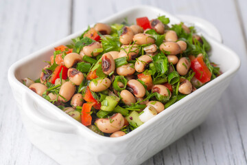 Traditional delicious Turkish food; dried black eyed peas salad (Turkish name; kuru borulce...