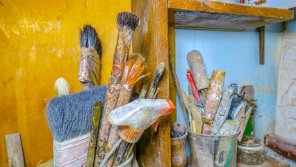 Set of old brushes in the artist's workshop