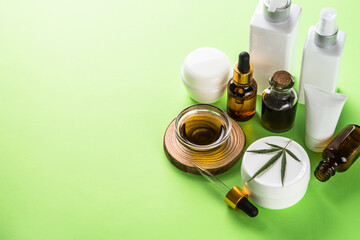 Cannabis cosmetic products. Natural cosmetic concept. Cream, soap, serum, essential oil and others.
