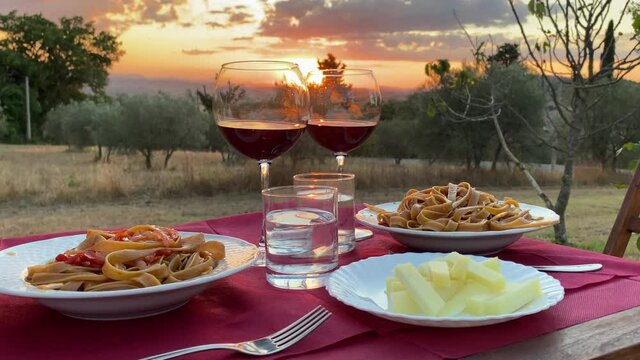Typical Italian Food, Romantic Dinner at Sunset in Tuscany, Val d'Orcia, Italy