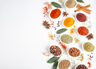 Assorted various spices on white background