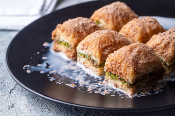 Traditional turkish new dessert cold milky baklava with pistachio (Turkish name; soguk baklava)