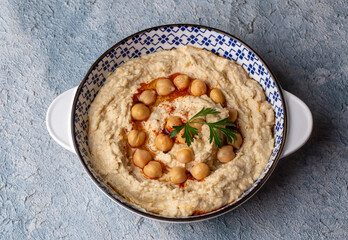 Hummus, chickpea on plate, traditional delicious Turkish food (Turkish name; Humus)