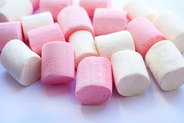 Multi-colored marshmallows. Background or texture of colorful pink marshmallows.