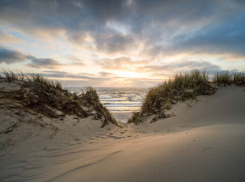 Sunset at the sand dune beach
