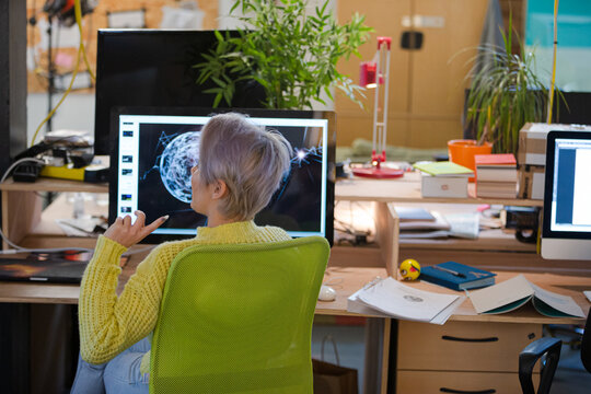 Young woman working at computer