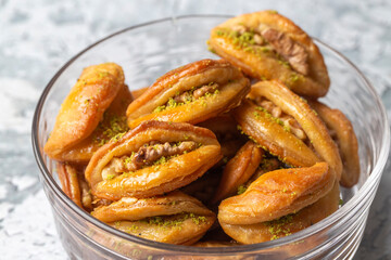 Dilberdudagi with walnut, traditional feast and ramadan dessert with syrup (Turkish name; Dilber dudagi)