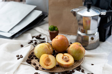 mix of plum, summer punch plum, greem plum, donut peach put on wooden background, all fruit like...