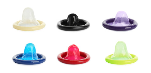 Set with different unpacked condoms on white background. Banner design