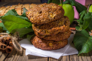 Fall traditional baking, homemade apple cake and apple pie oatmeal cookies, halloween thanksgiving, autumn baking food, cozy baking wooden background copy space
