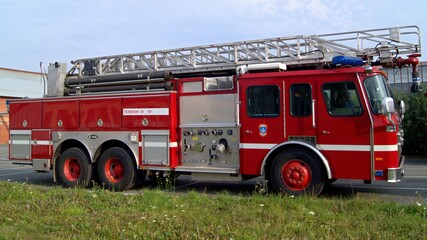 Fire truck with retractable ladder for extinguishing fires at height.  A fire truck for delivering...