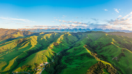 Green grassland and mountain natural landscape in Nalati grassland,Xinjiang,China.Aerial view.Nalati Grassland is China's sky grassland.