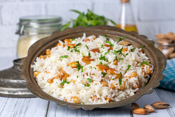 Traditional delicious Turkish food; Almond rice pilaf (Turkish name; Bademli pirinc pilavi)