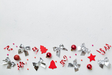 New Year composition white christmas snowflakes. Christmas decor background with pine cones. Top view with copy space