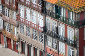 Porto, Portugal, October 31,2020. View on colorful old houses on hill in old part of city and...