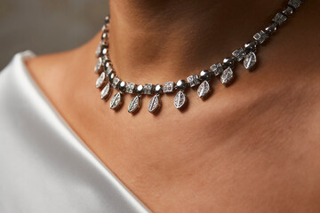 Beautiful woman with a necklace, beauty and accessories