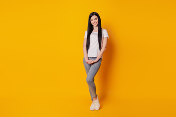 Fototapeta na wymiar Photo of cool attractive girl happy positive smile wear casual outfit isolated yellow color background