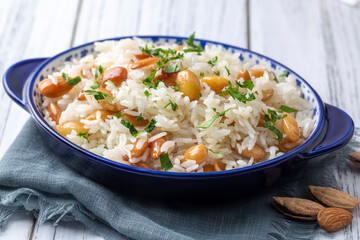 Traditional delicious Turkish food; Almond rice pilaf (Turkish name; Bademli pirinc pilavi)