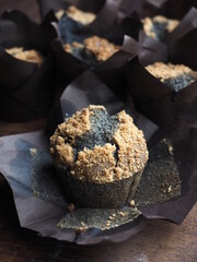 Black cupcake with crumble