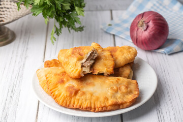 Traditional delicious Turkish foods,minced meat in savoury pastry (Turkish name; ci borek or cig borek)