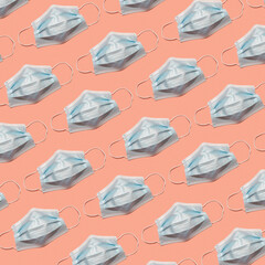 pattern of disposable masks on a pink background
