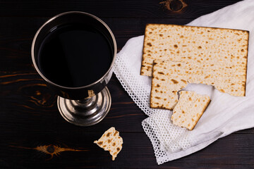 holy communion chalice with wine, bread and Bible. Lord's supper