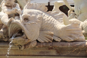 Piazza Navona Neptune Fountain Detail with Gushing Fish in Rome, Italy