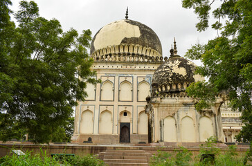 Fototapeta na wymiar Antique Islamic Architectural Art Seven Tombs Dome of Qutub Shahi Rulers of Hyderabad