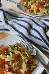 Selective focus to Mexican-style egg dishes