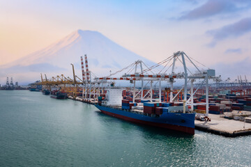 Containers ship and shipping ports logistic sea freight load unloading by crane industry and...