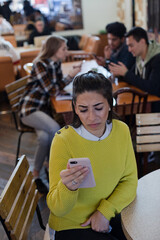 Teenage girl using smart phone