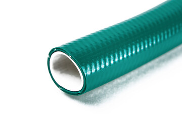 The cut tip of the rubber hose, on a white background