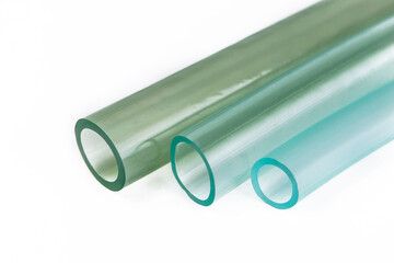 Tips of rubber hoses of different diameters, on a white background