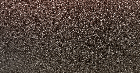 brown glitter bokeh circle glow blurred and blur abstract. Glittering shimmer bright luxury . White and silver glisten twinkle for texture wallpaper and background backdrop.