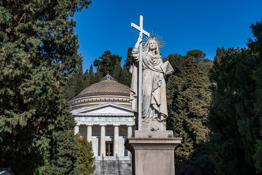 Italy. Liguria. Genoa. Statue of Allegory of Faith (or Religion), by Santo Varni, in the Staglieno monumental cemetery. Behind it, the so-called "Pantheon". 